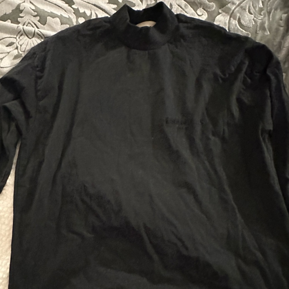 Black Essentials long sleeve shirt.